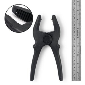 Spartan® Plier Clamp Heavy with a 55mm mouth opening in Noryl, next to a metallic ruler